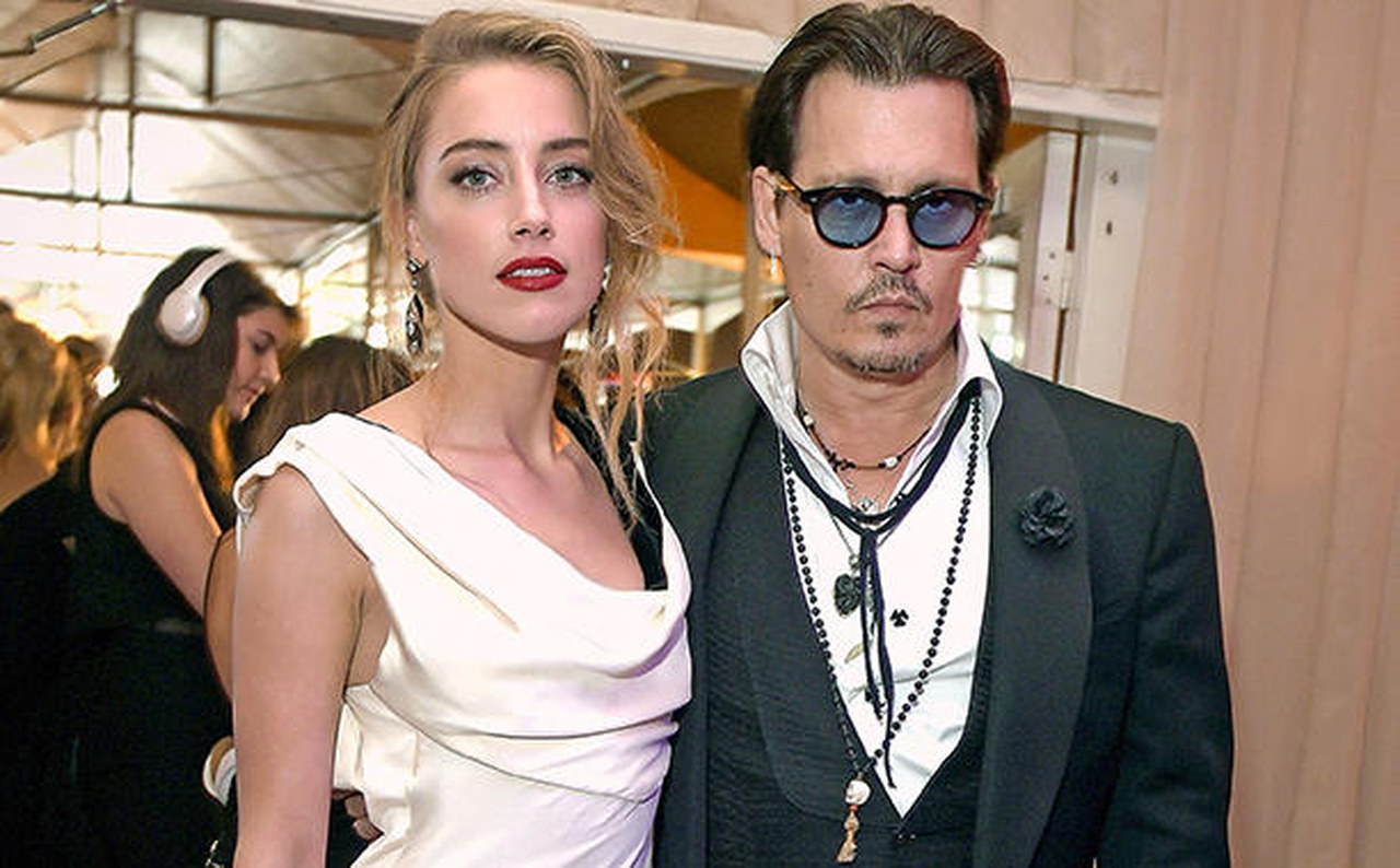 Johnny Depp e Amber Heard hanno raggiunto gli accordi per il divorzio