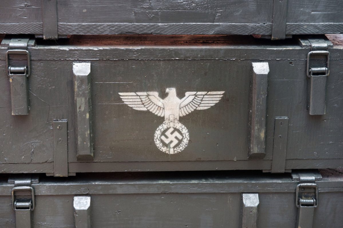 Ammo cases which have Nazi swastika's painted on the side. Blenheim Palace, Churchill's birthplace has been turned into a Nazi Film set for the upcoming Transformers 5 film. Various war time vehicles and guns including a tank are covered up for the secret filming. Pics by Dan Charity