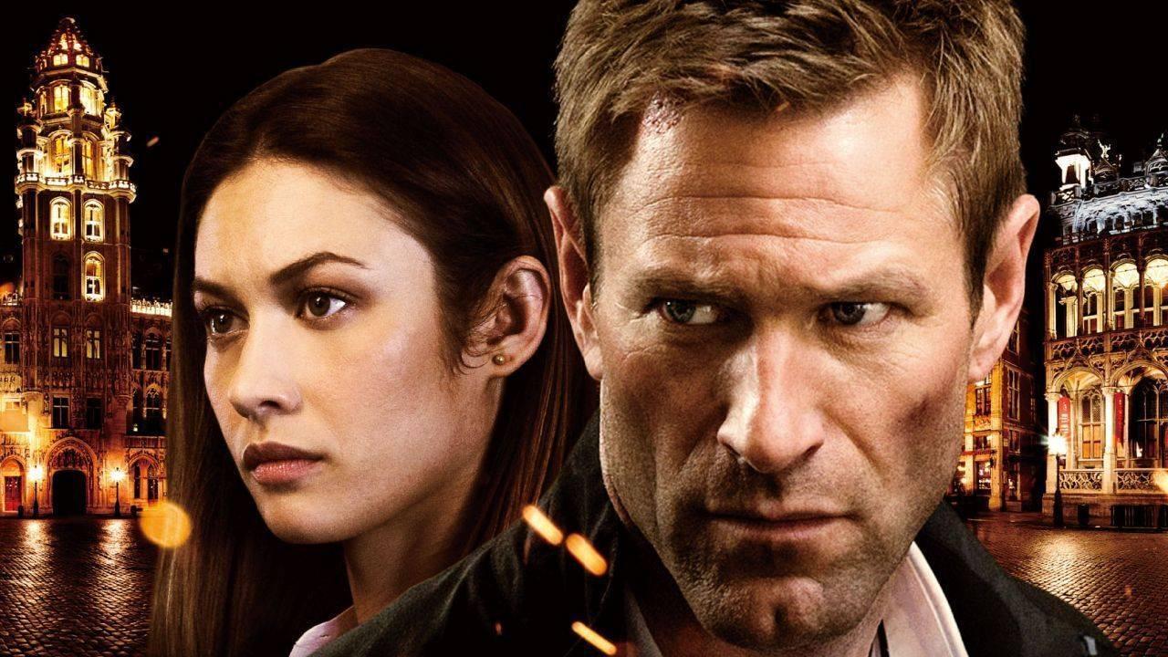 The Expatriate: la spiegazione del finale del film con Aaron Eckhart